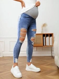 SHEIN Maternity Wideband Waist Ripped Raw Hem Skinny Jeans -SHEIN STORE 168385603688823c657630f1a3f02ffa879d0006ac thumbnail 405x552